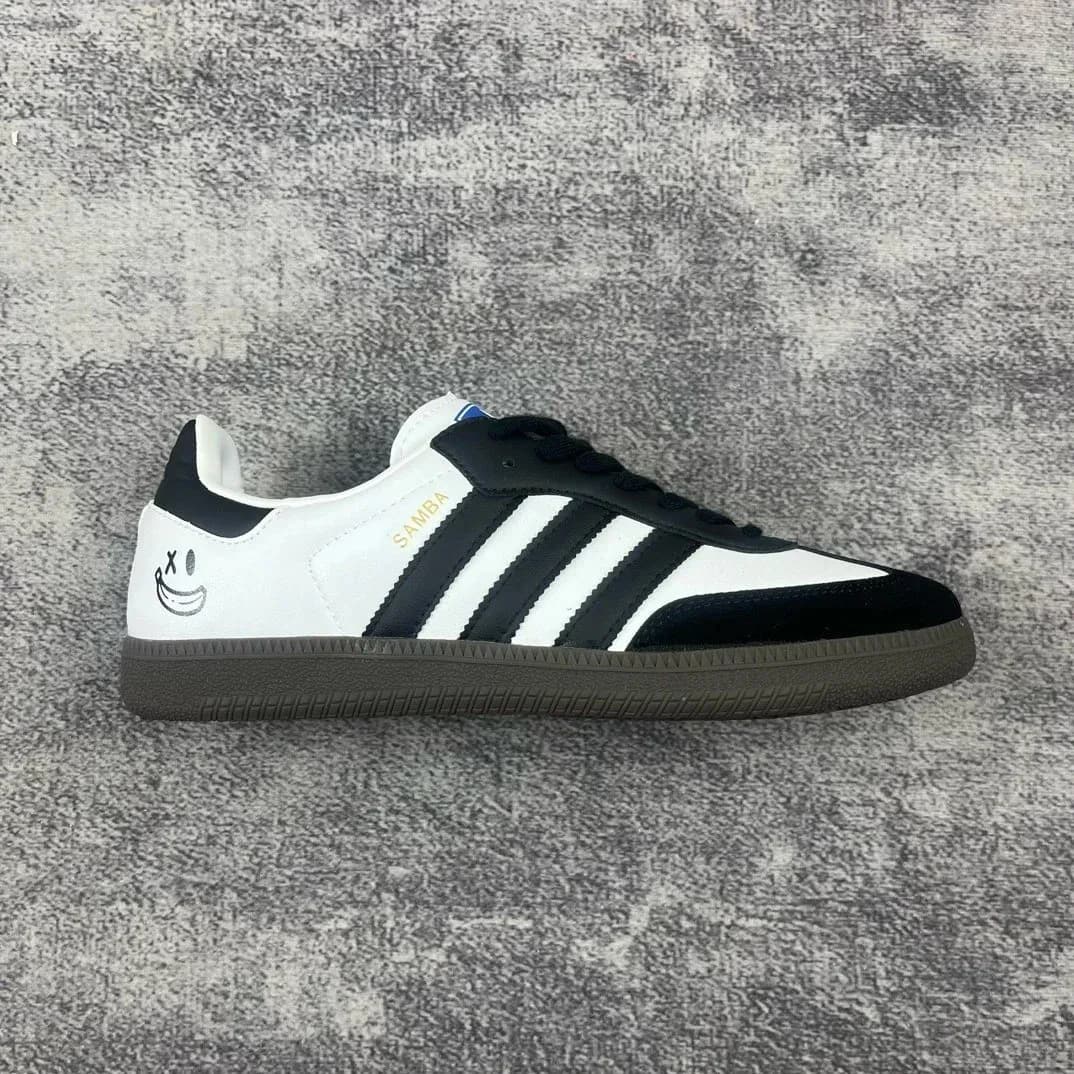 Black and White Low-Top Sneakers with Yellow Smile Detail